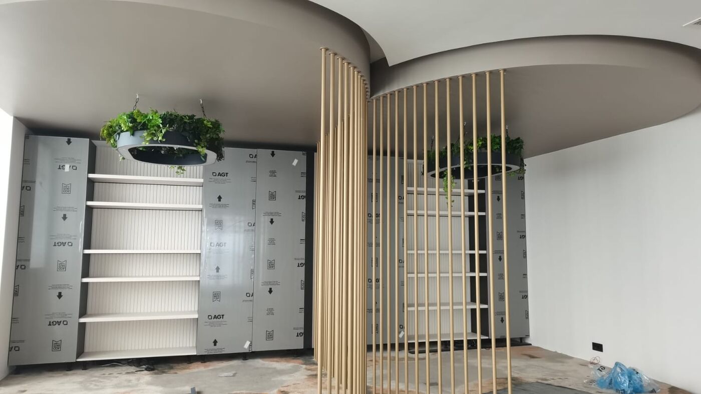 Interior finishes with wooden slats on steel structure